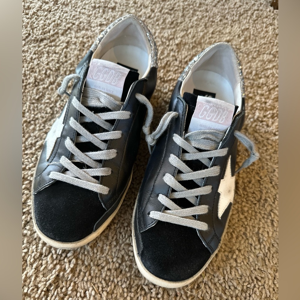 Golden Goose superstar low tops (7) black leather. Very good condition.